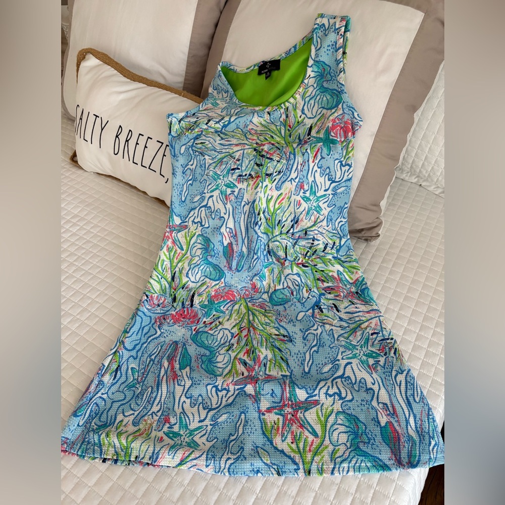 Ronni Nicole Green and Blue Dress